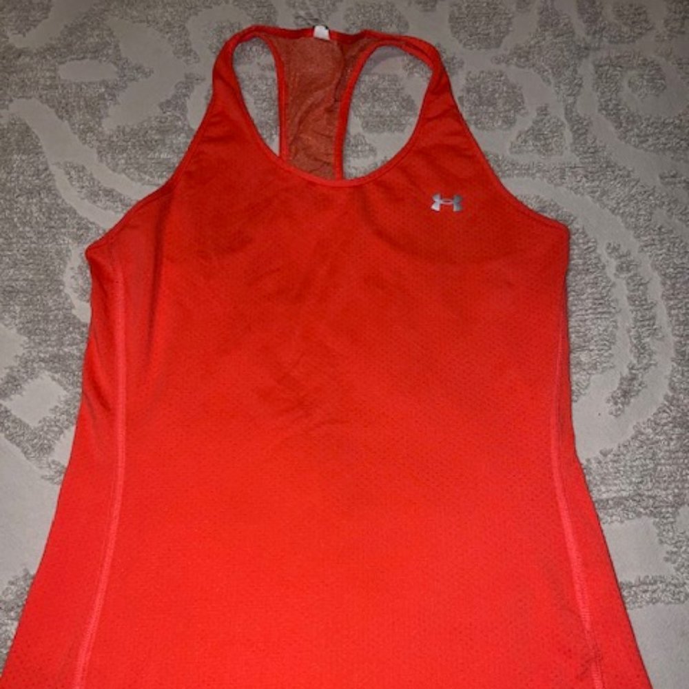 Bright coral colored racerback tank by Under Armour